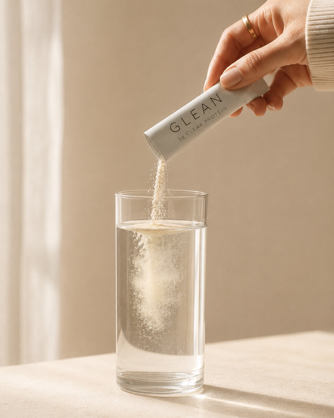 Pouring Glean into a drink